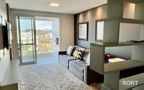 Living Cobertura Vista Mar no Edifício Amores da Brava Living Cobertura Vista Mar no Edifício Amores da Brava